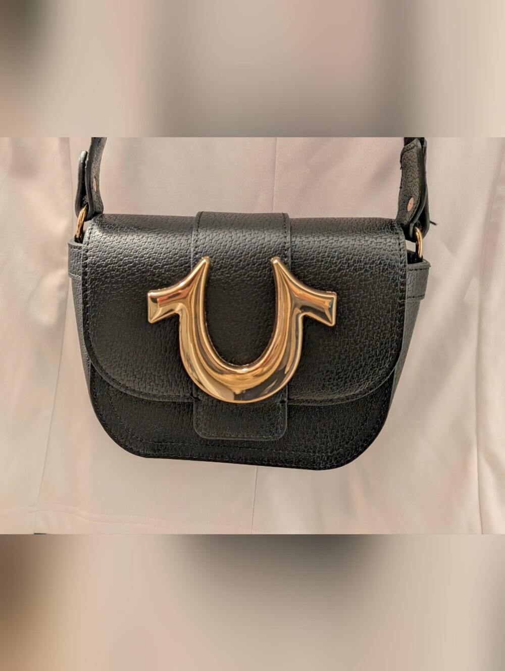 True Religion Small Black Vegan Leather Crossbody Bag with Gold Accent
